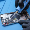 Removing old adhesive around the edges of the iPhone #1