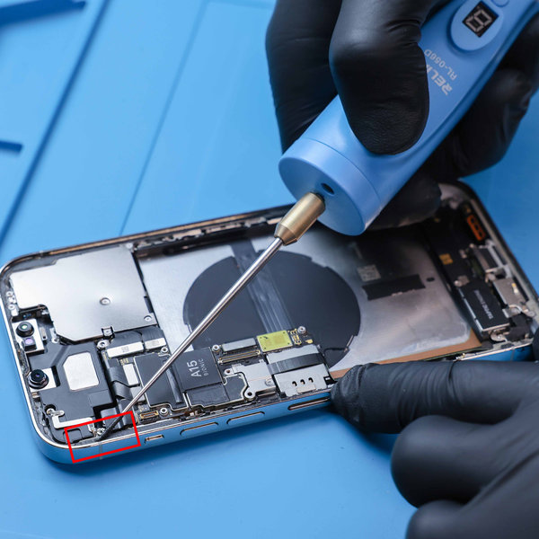 Removing old adhesive around the edges of the iPhone