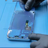 Applying new adhesive around the edges of the display frame #1