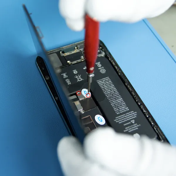 Unscrew the battery connector cover