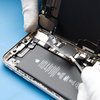 Unscrew the battery connector cover #2