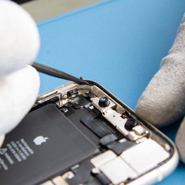 Peel off the old glue around the edges of the iPhone