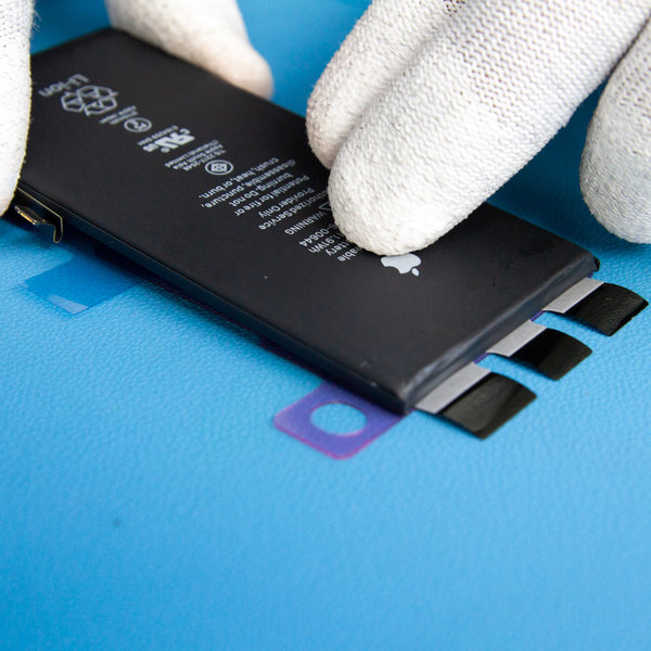 Apply new adhesive tape to the new battery