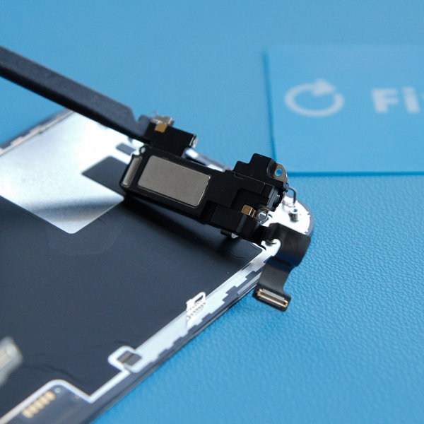 Flip the speaker assembly over