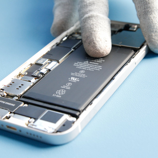 Insert a new battery into iPhone