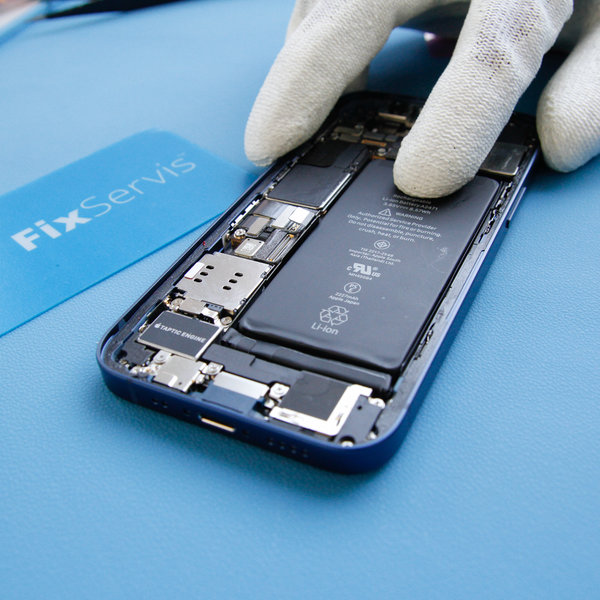 Insert a new battery into iPhone