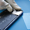 Peeling off the adhesive handles #4