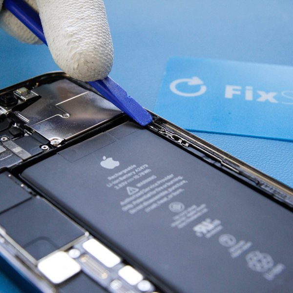 Peel off the old glue around the edges of the iPhone