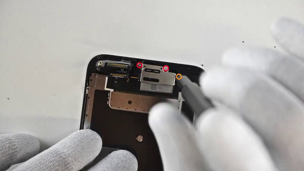 Disassembling the earpiece speaker cover