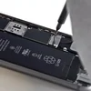Removing the accumulator console screws #1